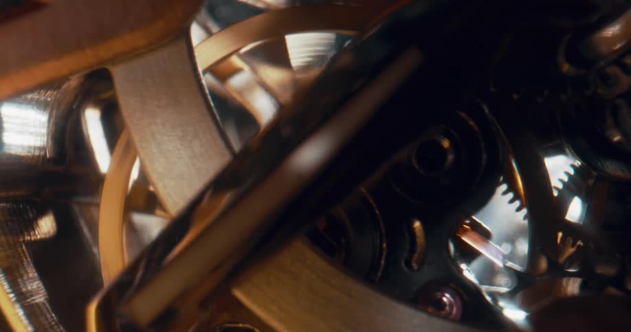 Gears spin and levels move up and down on a device