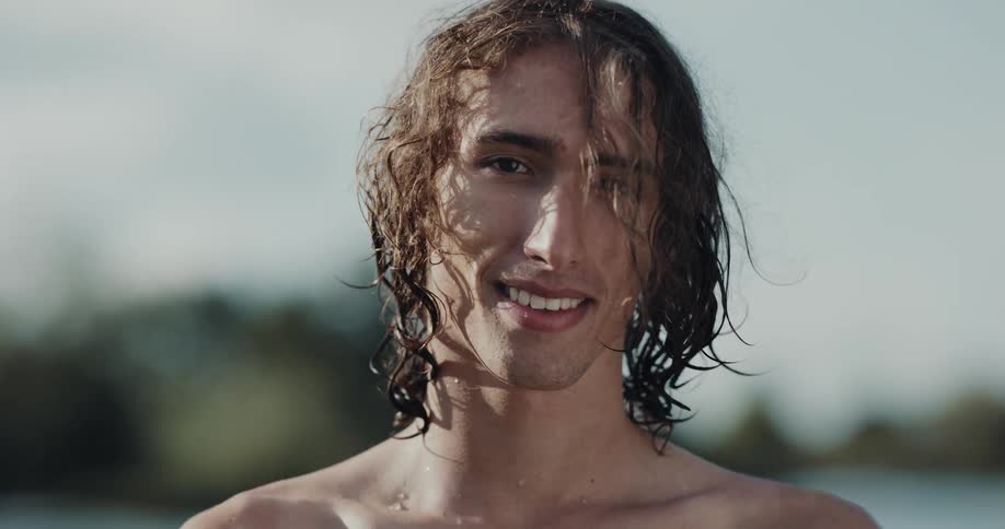 A portrait of a man standing outdoors
