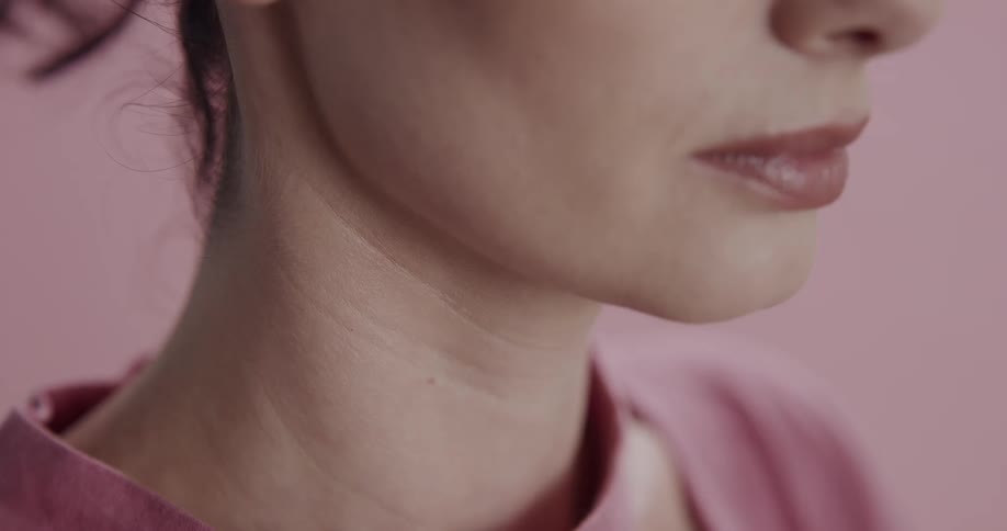 A woman is wearing lipstick