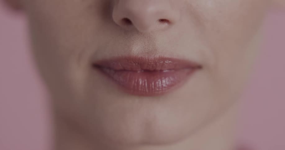 A portrait of a woman standing in a room