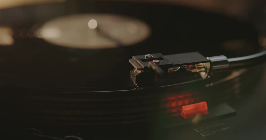A view of a cartridge landing on a record