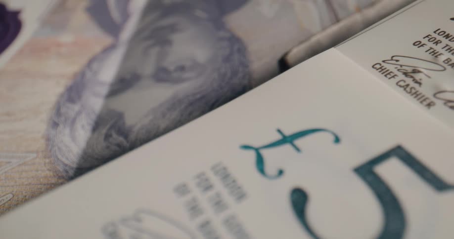 A pile of british banknotes