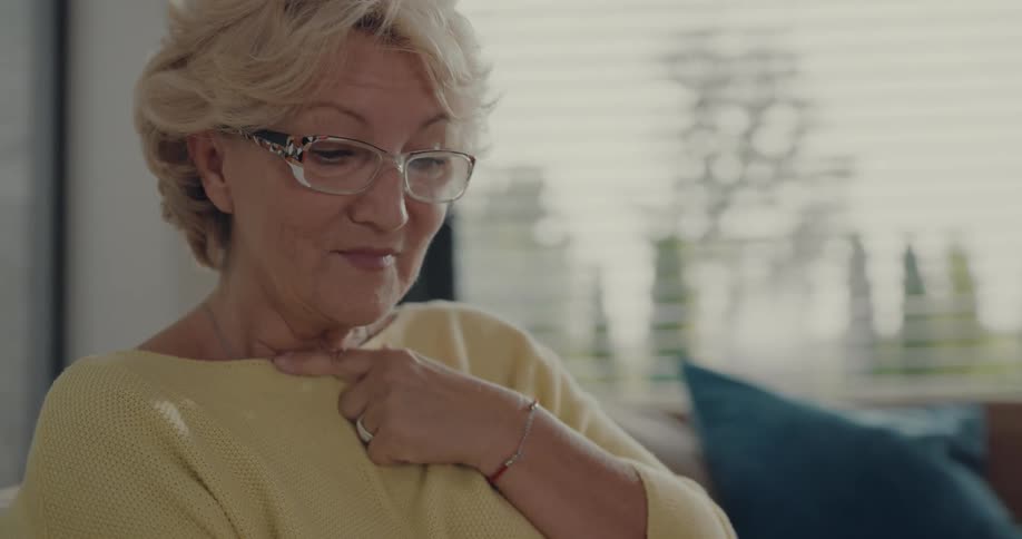 A woman is reading a magazine
