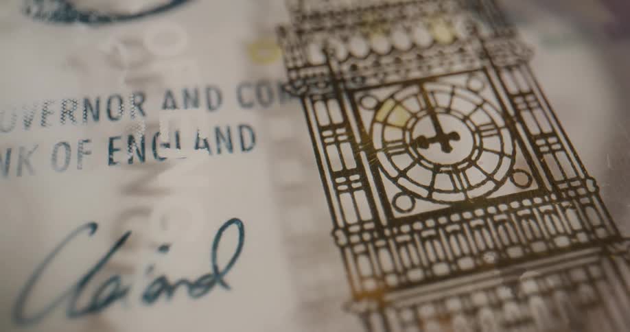 Artwork of a clocktower on a british banknote