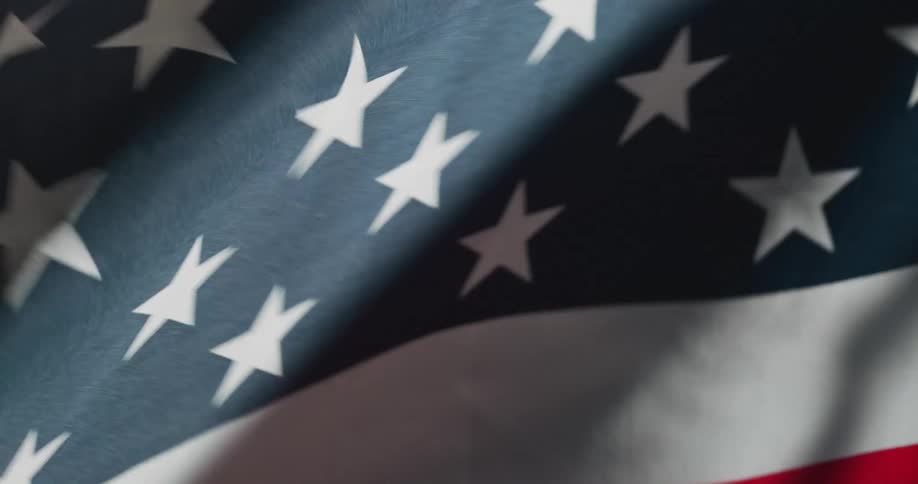 The american flag flies in the wind