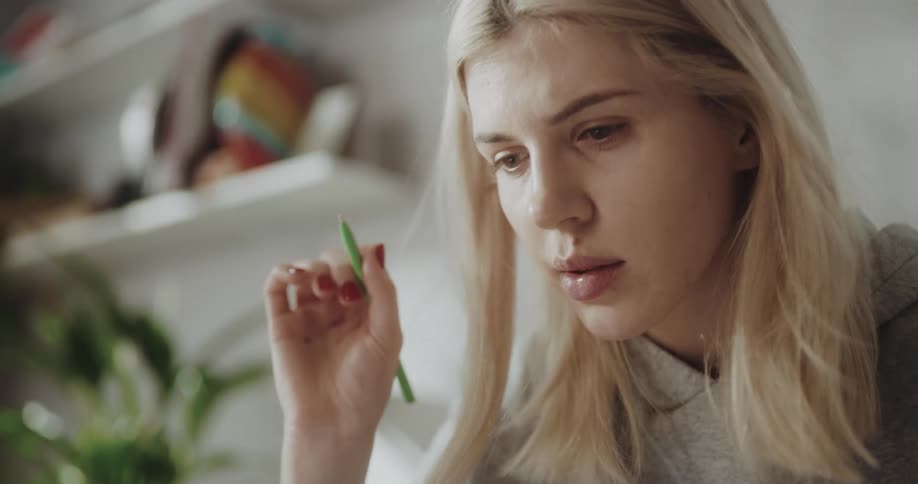 Young woman is sitting down