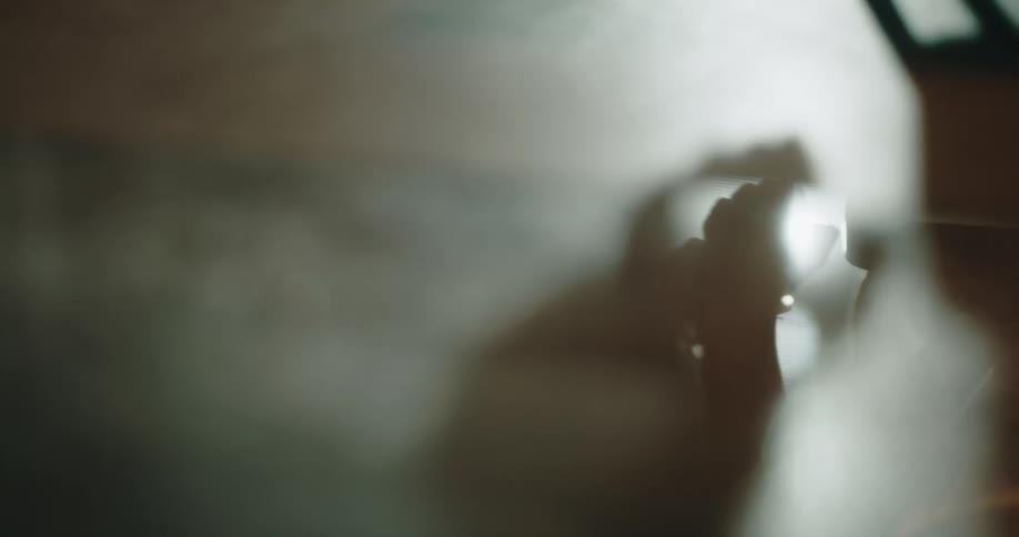 A person is moving around in the haze