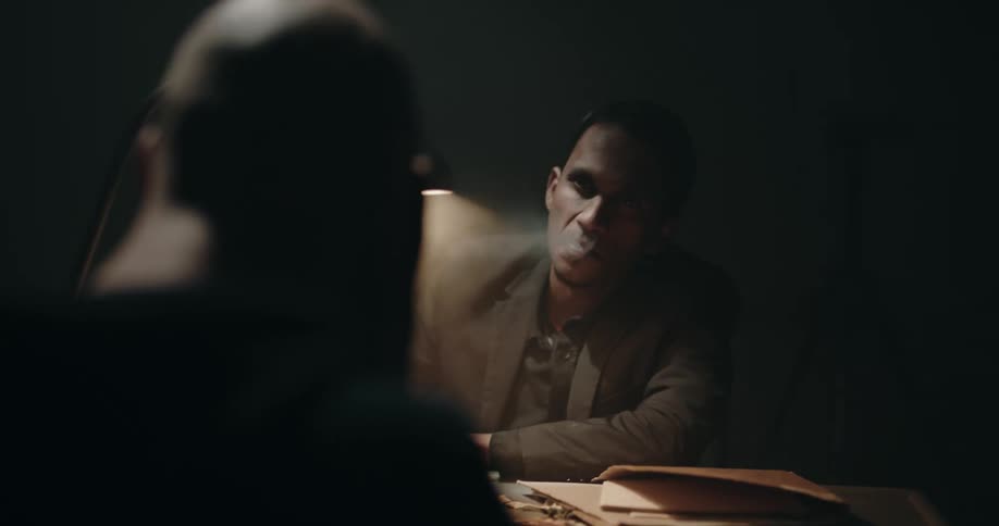 A man is worried as he is being interrogated
