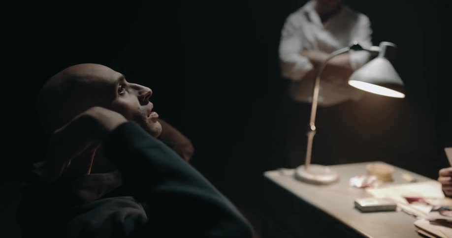 A man is being interrogated