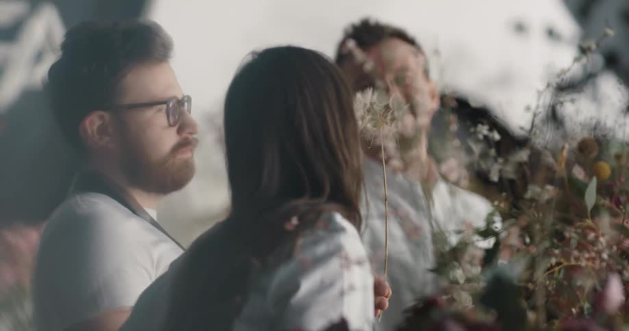 People laugh in the flower shop