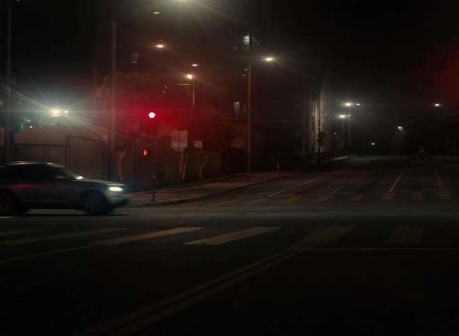 An intersection in a city at night