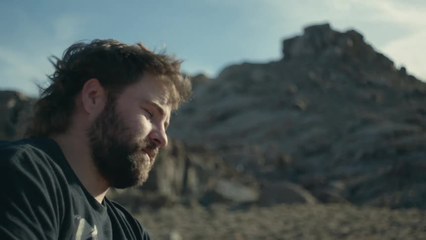 Man is smoking outdoors