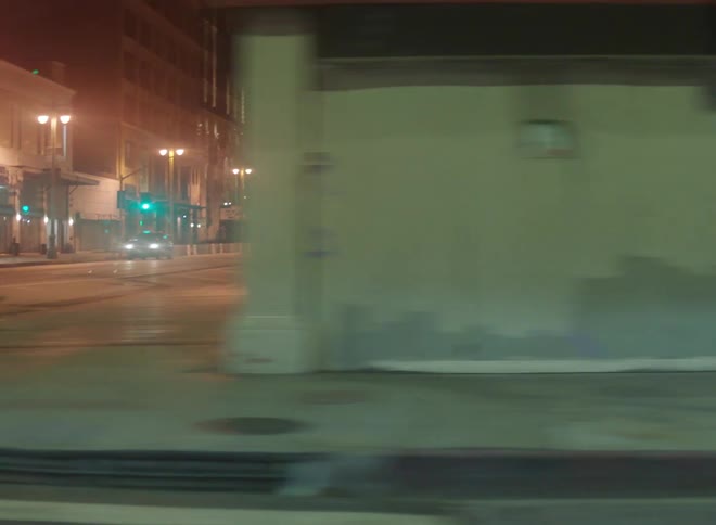 An intersection in a metropolis at night