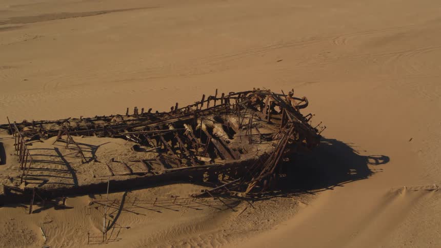 Aerial view over Eduard Bohlen shipwreck in the desert of Namibia