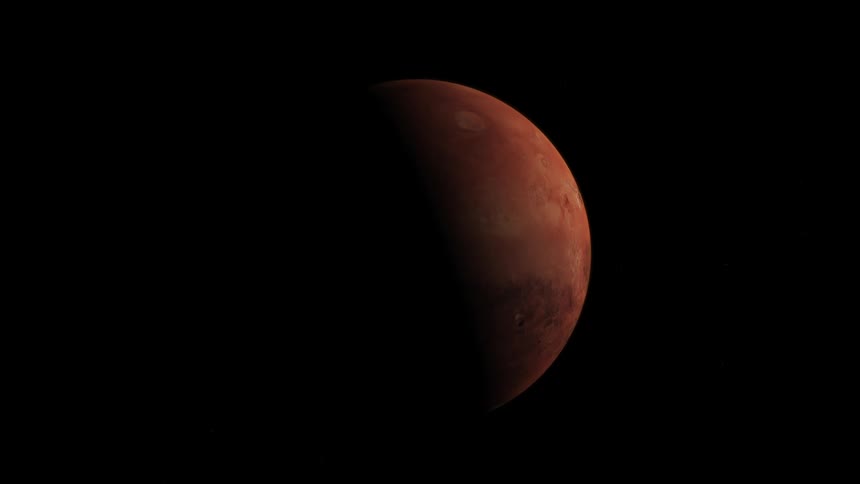 A view of a planet in space is displayed on camera