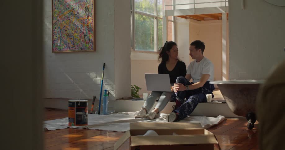 Young woman and man are sitting down