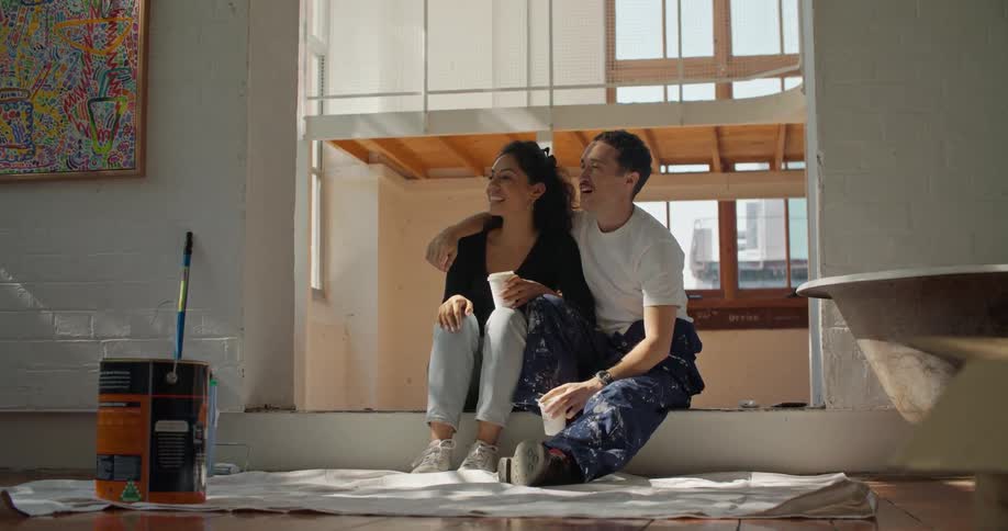 Young woman and man are sitting down