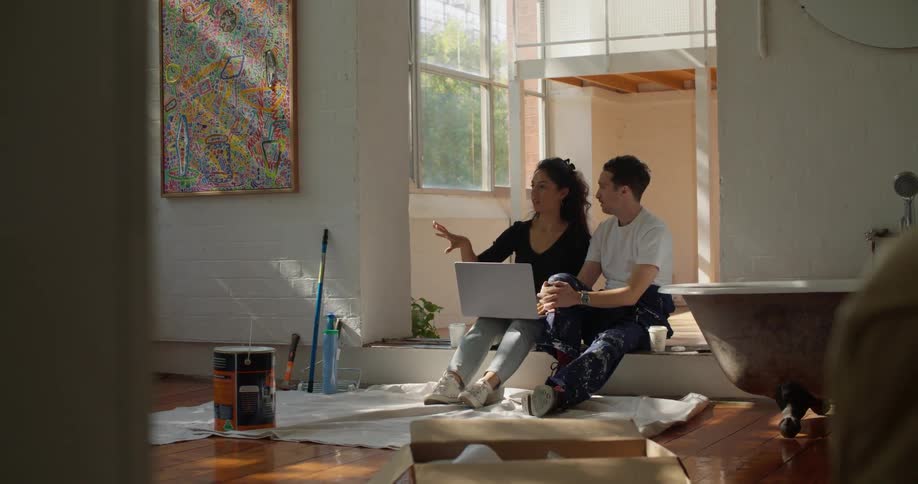 Man and woman are sitting down talking to each other