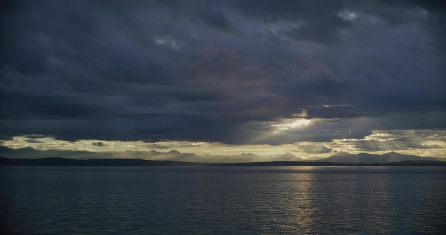 The sun is shining on the ocean water