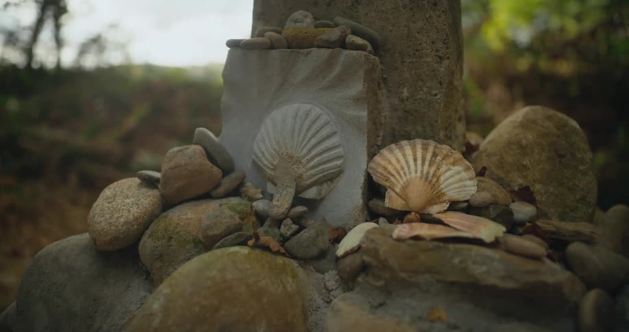 Statuary includes shell carving and has real shells and stones set on it