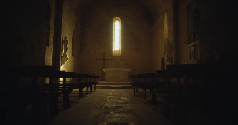 The church is dark and empty during the day