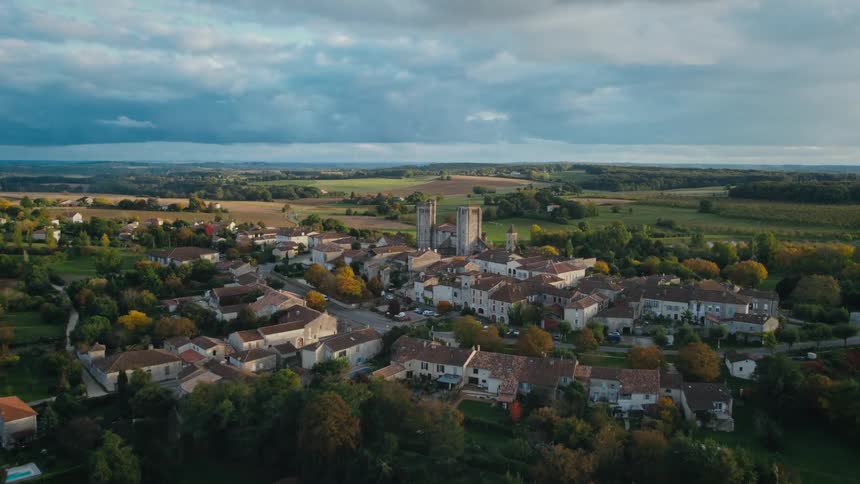 A small town in the countryside on a cloudy day
