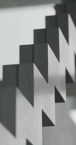 A white and gray zig zag object