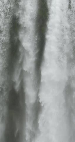 A waterfall gushing over a cliff