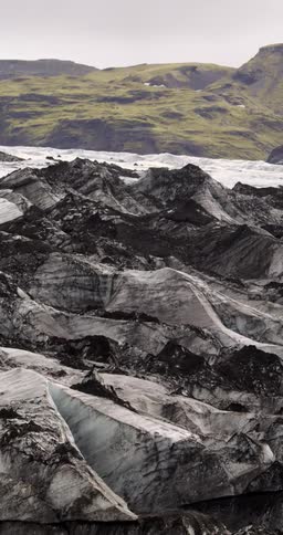Landscape view of large rocks in front of hills