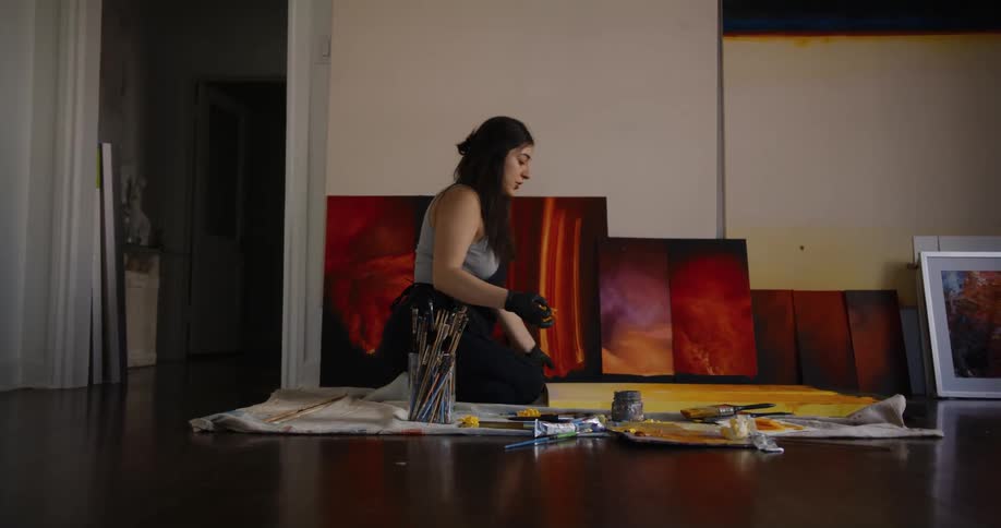 A woman is painting