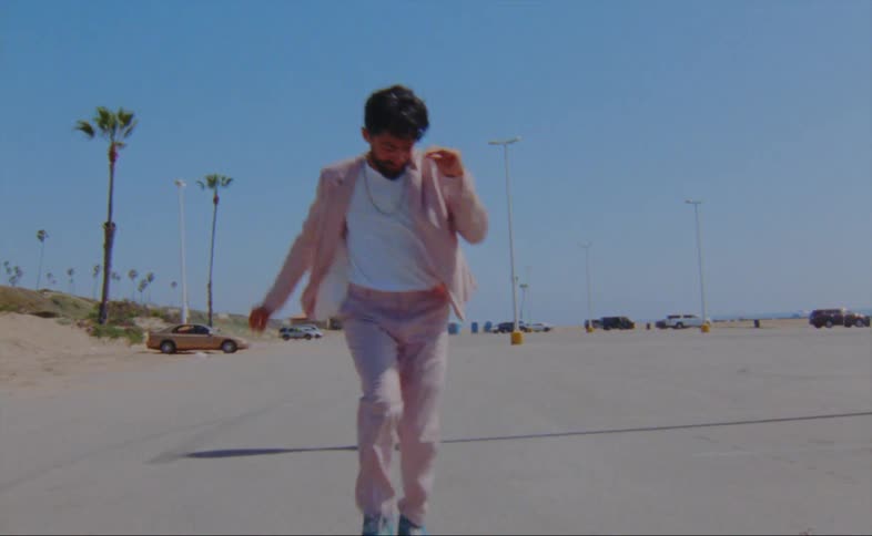 A man is dancing in his roller skates