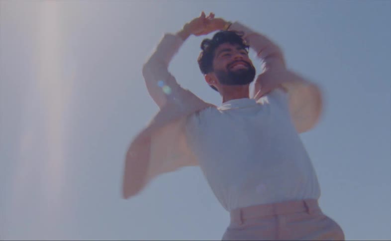 A man is spinning as he dances