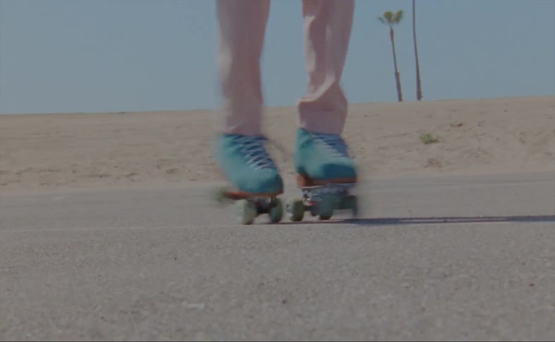 A man dancing on skates outdoors