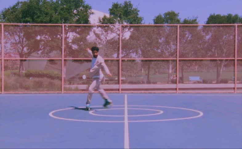 A man dancing on skates outdoors