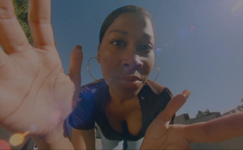 A selfie of a woman outdoors