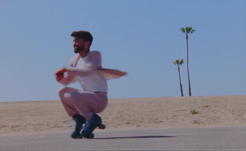 A man dancing outdoors