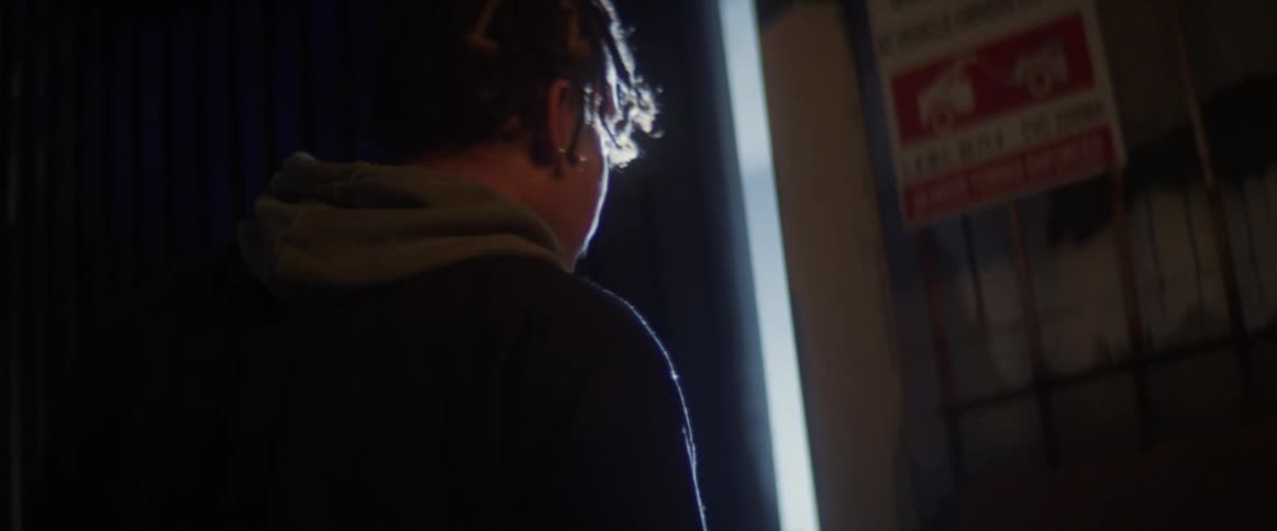 A man enters the garage