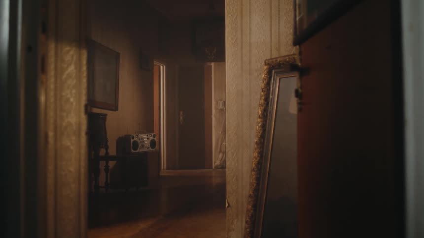 A radio is at the end of the hall
