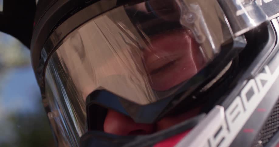 Close up of the visor of a person wearing a helmet