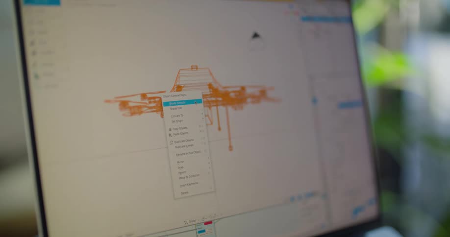 A computer user is creating an object with three dimensional software