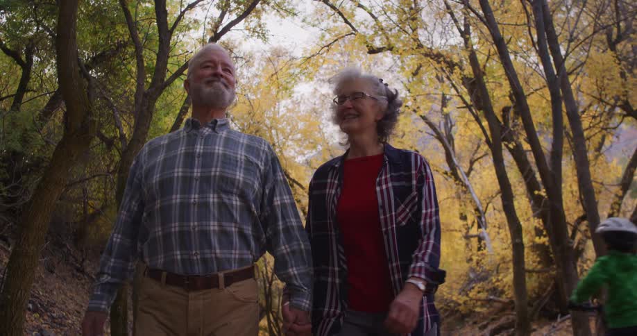 A man and woman hiking outdoors