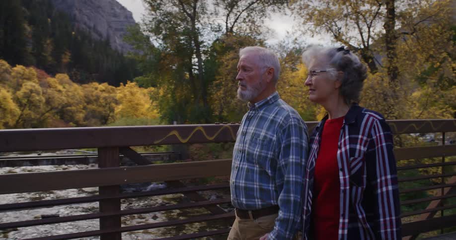 A man and woman walking outdoors