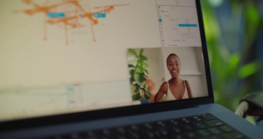 Close up of a woman talking on a video call through a laptop