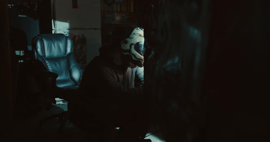 A man is working with tools in his living room
