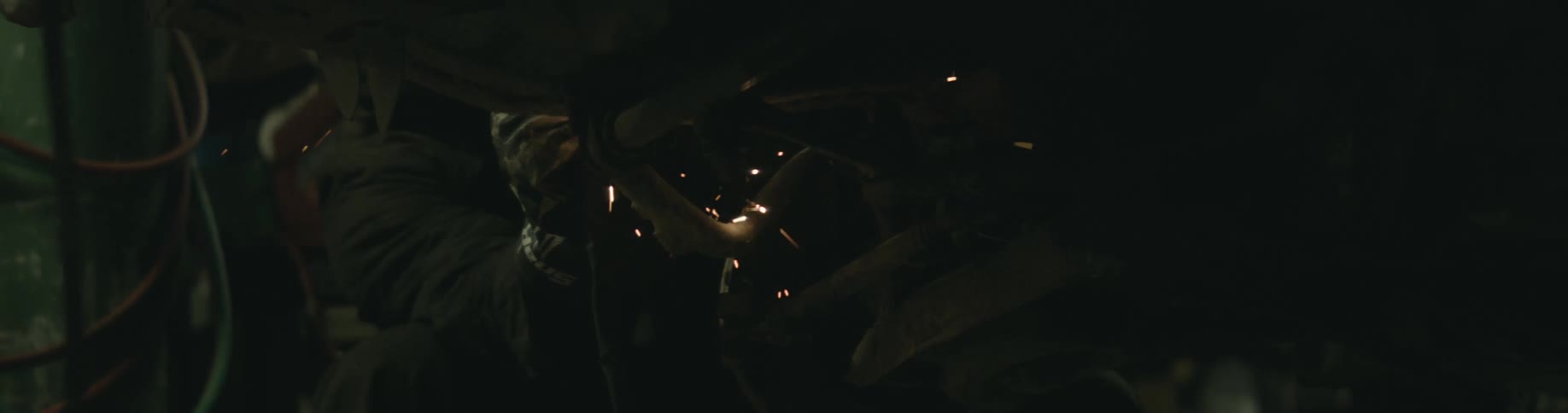 Sparks are flying from welding in a vehicle