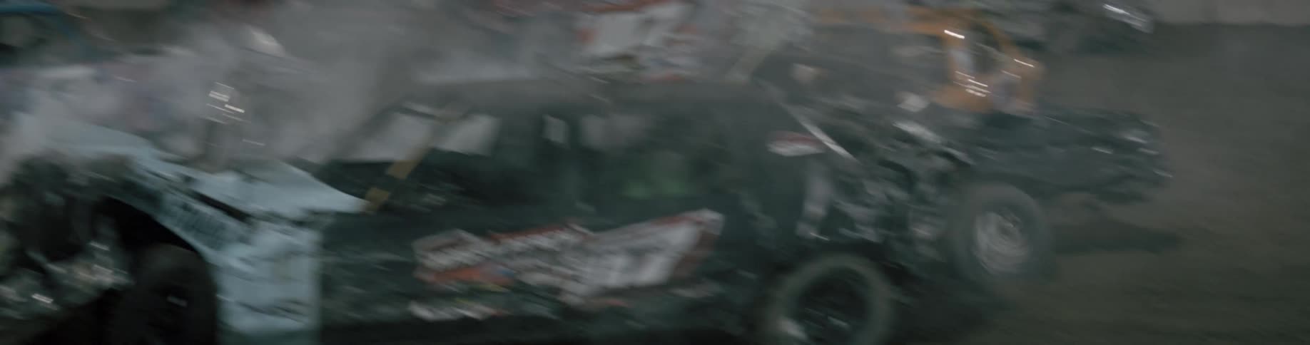 Cars that are racing against each other in the day time