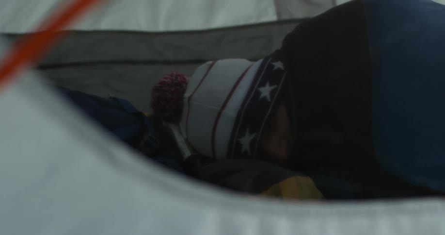 Someone is sleeping inside of this tent