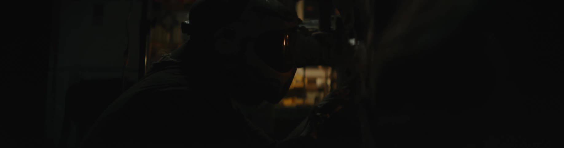 A mechanic is welding in the shop