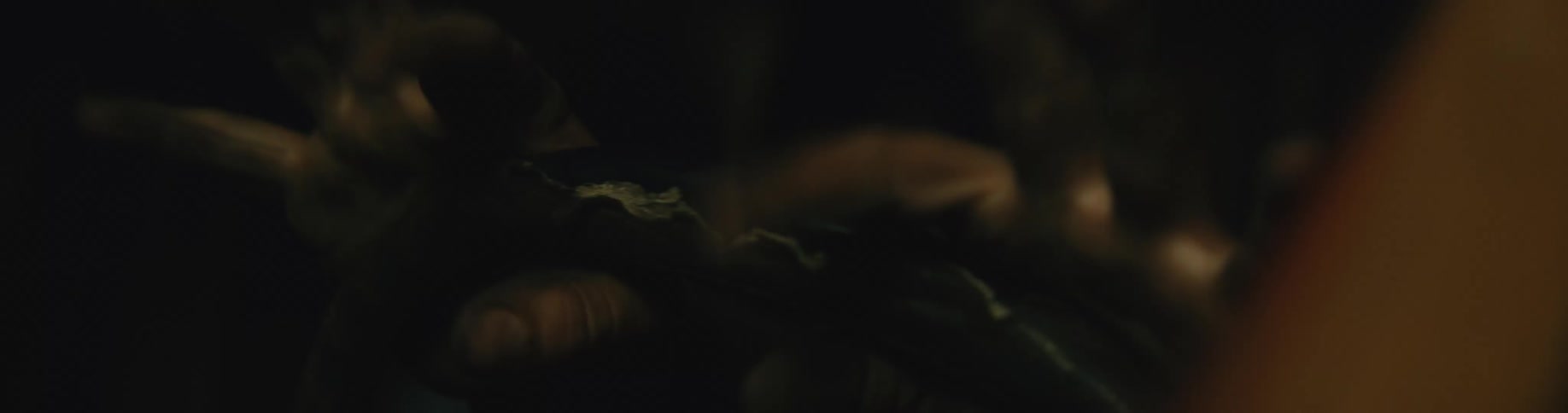 An automobile driver is clenching the steering wheel and takes off