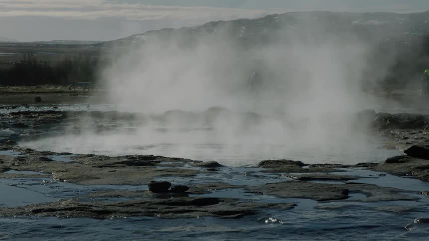 Steam coming out of a natural hot spring hot tub